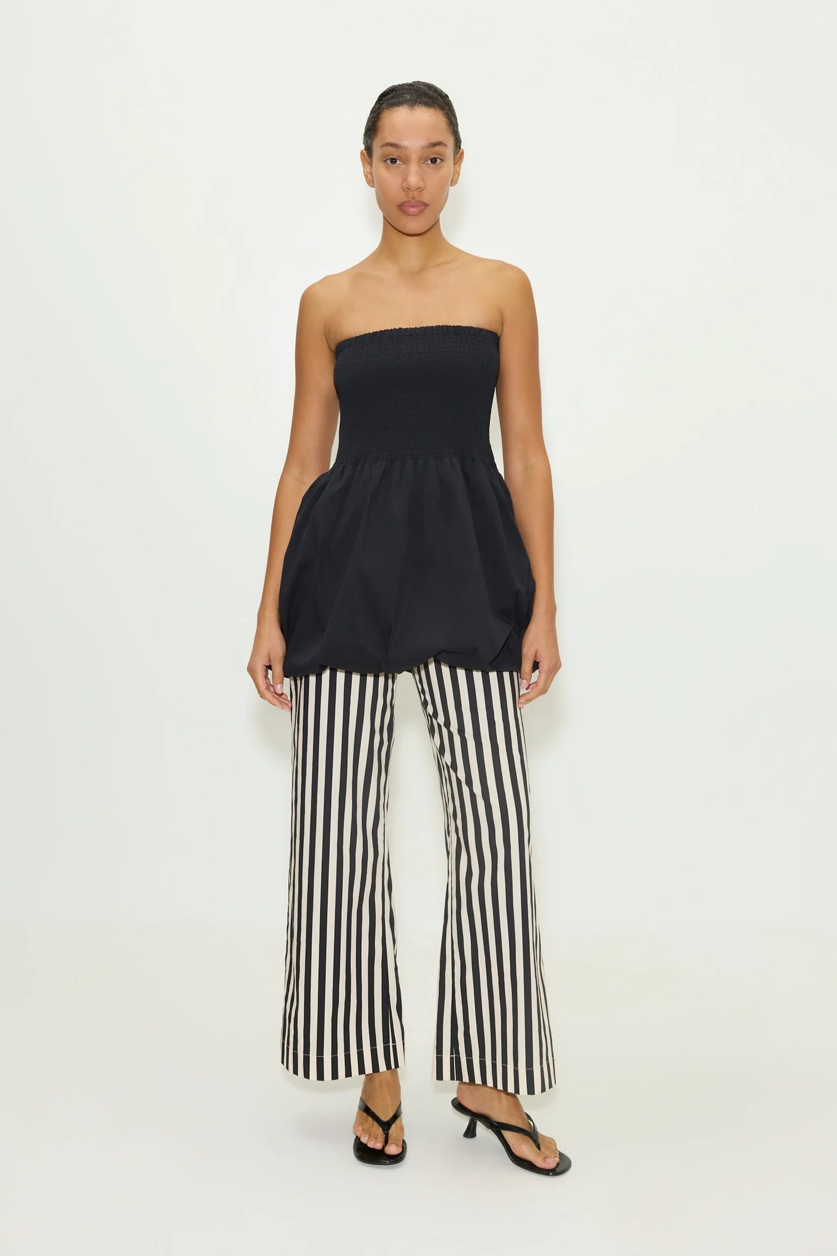Via Smocked Mini Dress in Black - Image 2